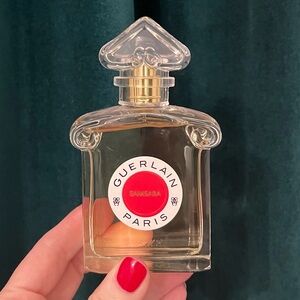 Guerlain Samsara Fragrance with Gold and Red Accents